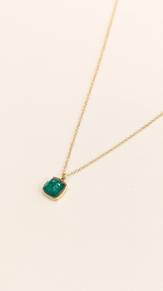 Gold necklace with green pendant